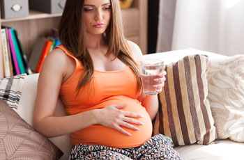 Причины изжоги во время беременности на ранних сроках