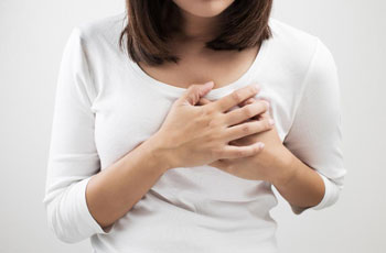 Симптомы мастодинии: болевые ощущения и повышенная чувствительность в грудной железе